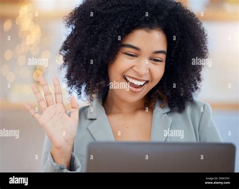 Video Call Laptop And A Wave Black Woman On With Smile Talking And Smiling In Office