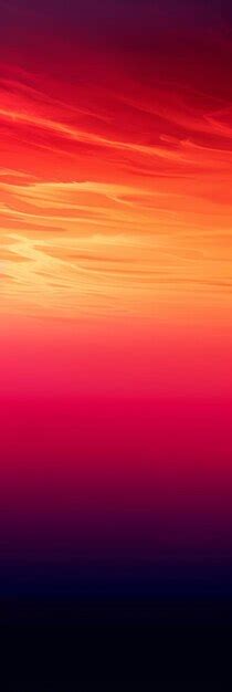 A Pink Sky With A Yellow And Orange Sunset In The Background Premium