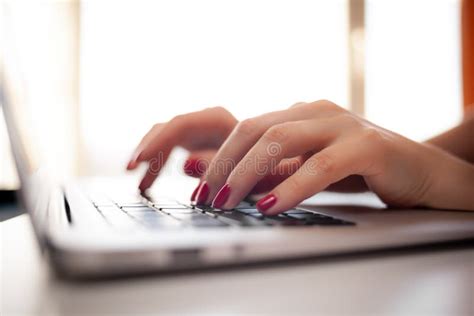 The Girl Behind The Laptop Female Hands Typing Text On The Keyboard Stock Image Image Of Hand