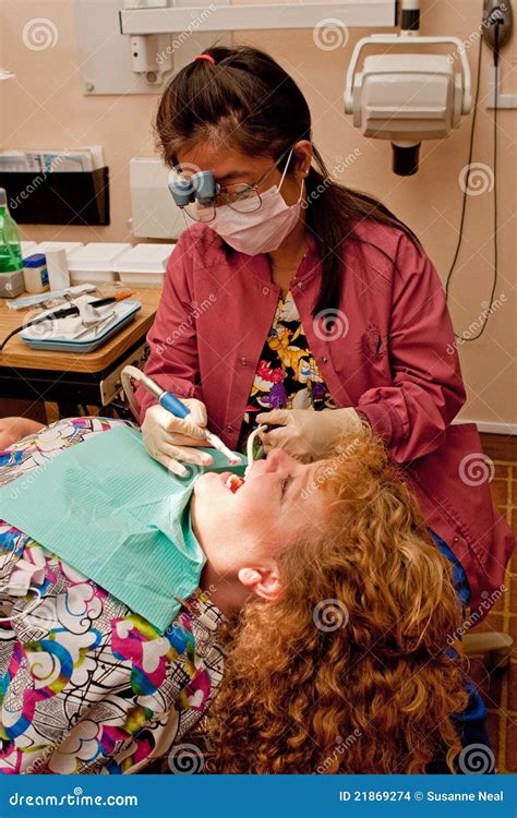 Dental Hygienist Cleaning Patient S Teeth Stock Photo Image Of