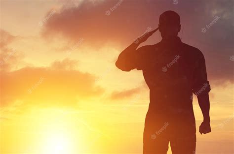 Premium Photo | Young military soldier man silhouette on sunset background