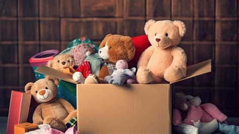 Premium AI Image | A box of stuffed animals sits in front of a pile of ...