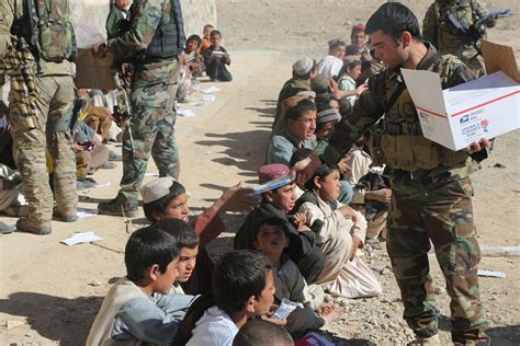 An Afghan National Army Special Forces Soldier Hands Nara And Dvids