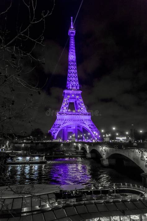 The Iconic Eiffel Tower Illuminated At Night In Paris France Editorial