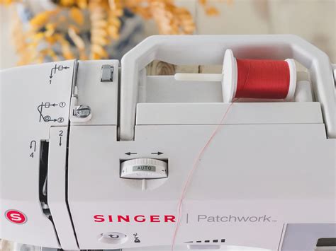 how to thread a bobbin in a singer 7