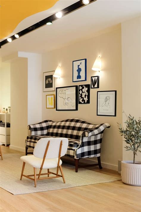 Gallery Wall With Nude Drawing By Ba Ousmane And Abstract Botanical Paintings By Kate Roebuck