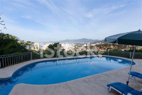 Swimming Pool Overlooking Acapulco Stock Photo | Royalty-Free | FreeImages