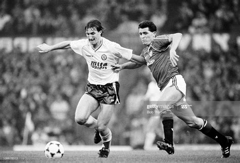 News Photo : Alan McInally of Aston Villa is challenged by ...