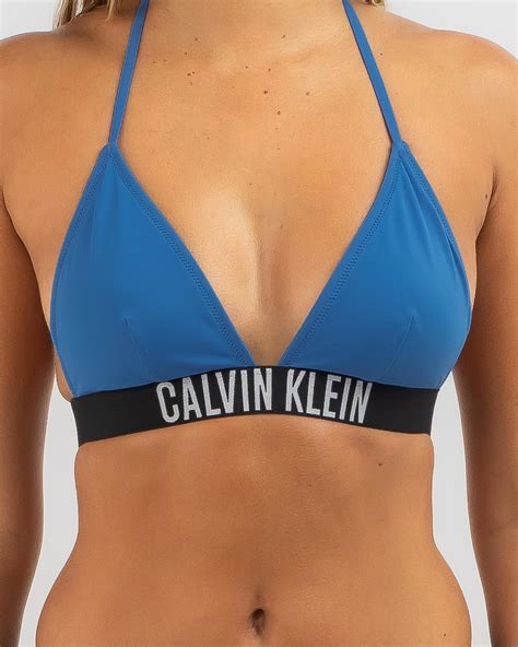 Shop Calvin Klein Fixed Triangle Bikini Top In Dynamic Blue Fast