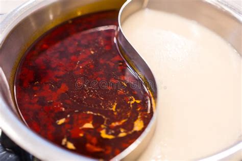 Chinese Hot Pot With Double Flavor Sichuan Pepper Soup Stock Photo Image Of Herb Dining