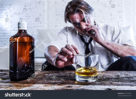 Sad Depressed Alcoholic Businessman On His Stock Photo 607237910