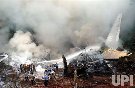 Photo Air India Express Plane Crashes 8 Of 166 On Board Survive