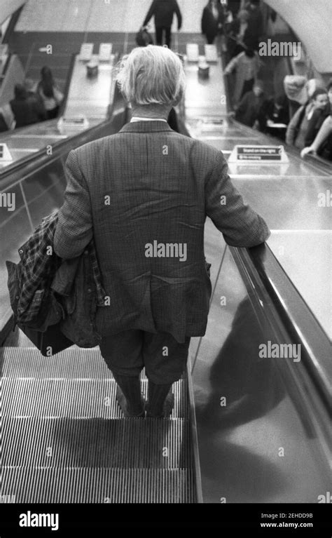 Man Sitting On Escalator Hi Res Stock Photography And Images Alamy