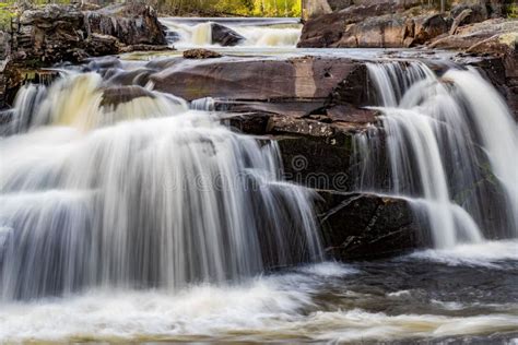 Foamy Cascade Flowing Into The Water With Splashes Stock Image Image