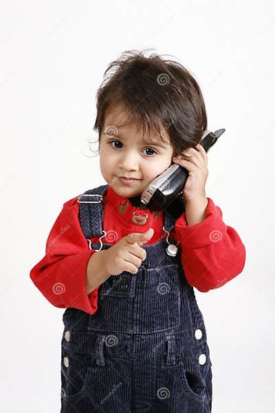 Kid playing with phone stock image. Image of dialing, talking - 8272817