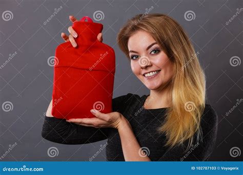 Woman Holding Warm Red Hot Water Bottle Stock Image Image Of Holding Smiling 102707103