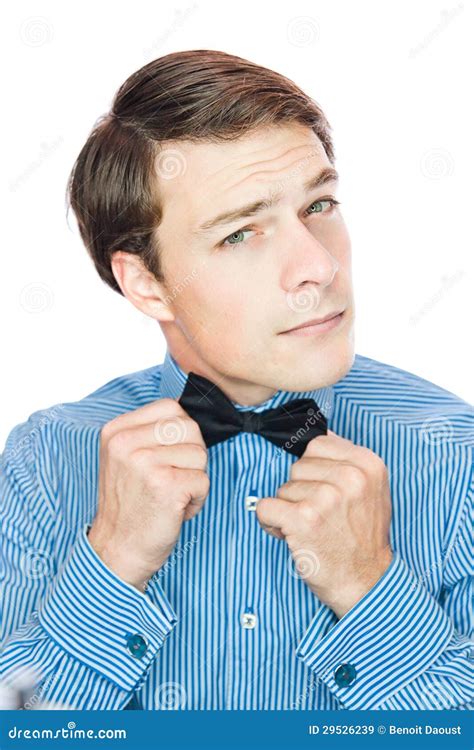 Handsome Old Fashioned Gentleman Adjusting His Bow Tie Stock Image