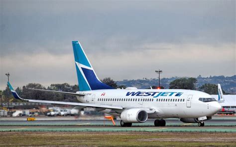 C GYWJ WestJet Boeing 737 700 By Pablo Armenta AeroXplorer Photo