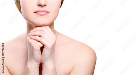 Portrait Of Girl With Nude Make Up With Hands On Chin Isolated On White Background Free Space