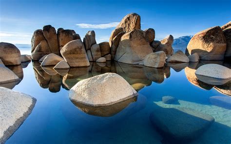 Serene Reflections Hd Wallpaper Of Natures Lake And Rocks By