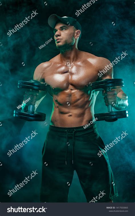 Muscular Fitness Sports Man Atlete Dumbbell Stock Photo