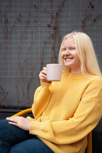 Free Photo Side View Smiley Woman Holding Coffee Cup