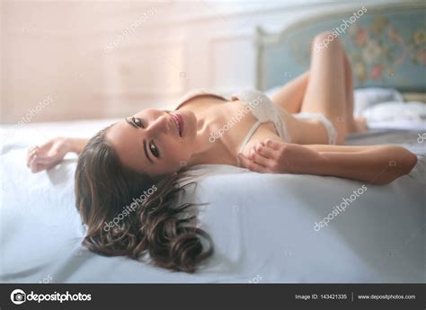 Woman Smiling In Lingerie Stock Photo By Olly
