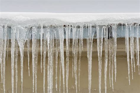 Big Icicles Hang from the Roof of a House. Stock Image - Image of hanging, detail: 141188435