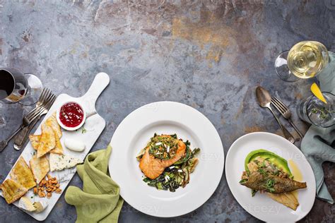 Big Dinner Table Overhead View With Steak And Fish 15758506 Stock Photo