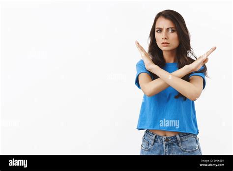 Stop This Immediately Serious Looking Unsatisfied And Unamused Reluctant Brunette Woman Making