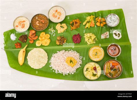 Onam Sadhya Indian Women Eating With Hand Boiled Rice Served For