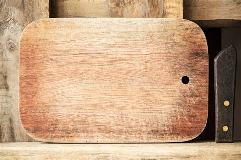 Chopping Cutting Board Block On Wooden Texture Background Stock Photo