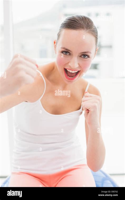 Fit Brunette Putting Her Fists Up Stock Photo Alamy