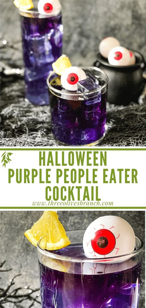 Halloween Purple People Eater Cocktail With Lemons And Eyeballs