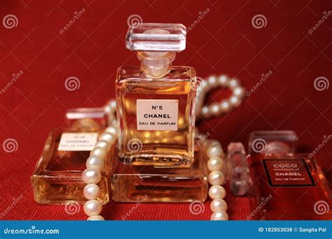 Chanel Perfume Bottles Isolated On Red Background Bottles With