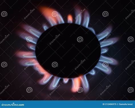 Natural Gas Burning A Blue Flames On Black Background Stock Image