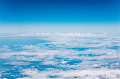 Premium Photo Clouds A View From Airplane Window