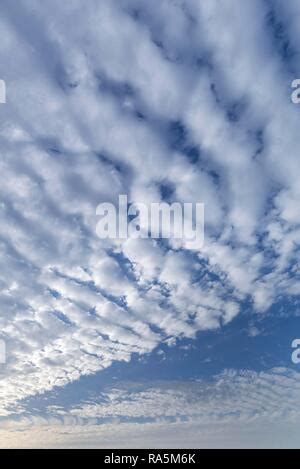 Altocumulus stratiformis cloud formation Stock Photo - Alamy