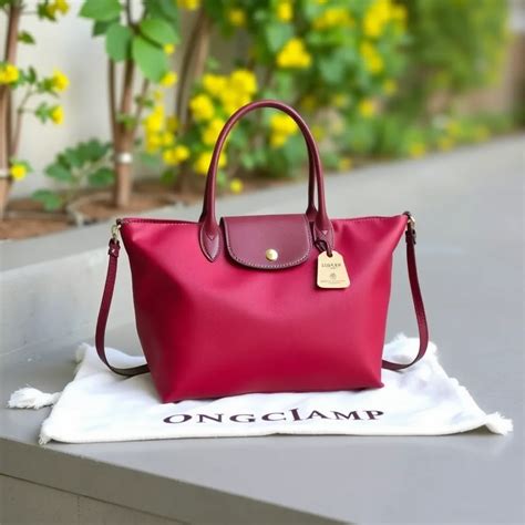 info harga tas longchamp selempang original wanita pria hargawebid