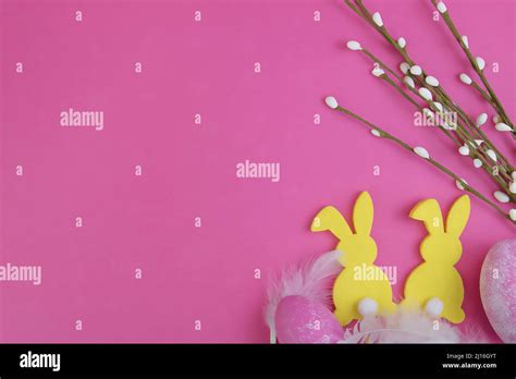 Easter Background Silhouette Of Rabbits Easter Eggs And Pussy Willow On A Pink Background
