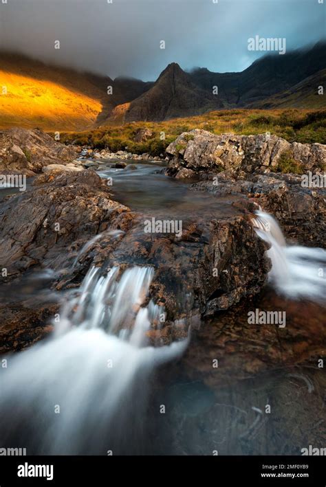 Fairy Pools Waterfall With View Of Famous Cuillin Mountain Range Isle