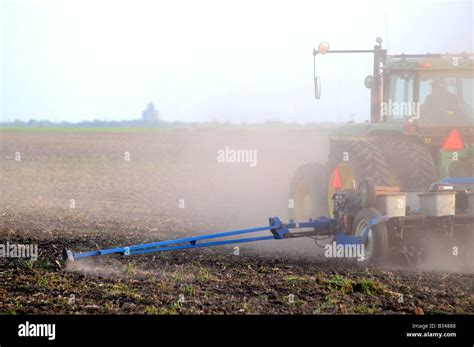 John Deere Tractor Planting Corn Or Soybeans In An American Farm Field