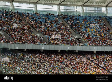 soccer stadium inside view. football field, empty stands, a crowd of ...