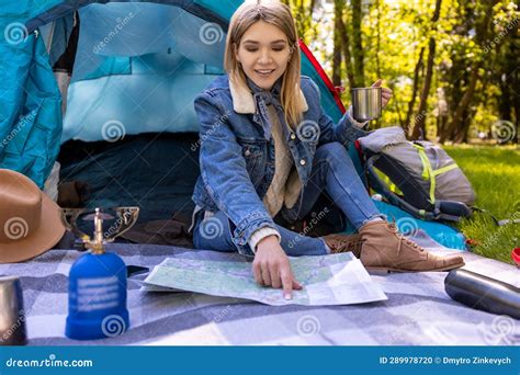 Blonde Cute Female Traveler Sitting Near The Tent In The Forest Stock Photo Image Of Forest