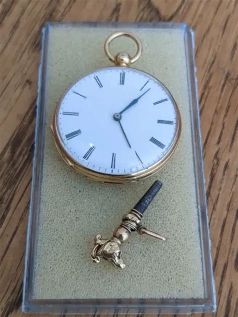 ANCIENNE MONTRE GOUSSET Or 18 k avec sa Clé a tête de Chien en Or 18k