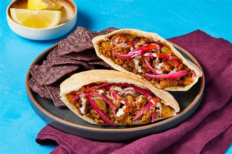 Shawarma Spiced Beef And Golden Raisin Pitas Recipe Hellofresh