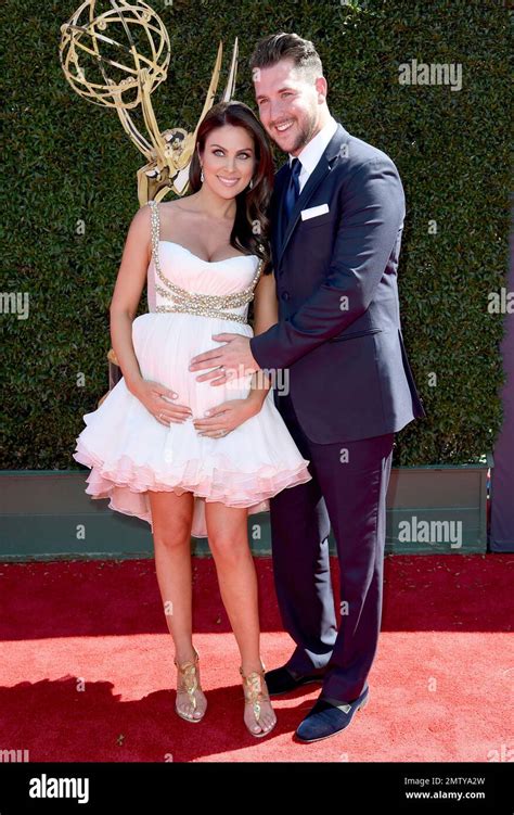 Nadia Bjorlin Left And Grant Turnbull Arrive At The 44th Annual Daytime Emmy Awards At The