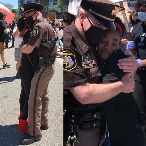Police in Muskegon, MI showing their support for protesters outside of