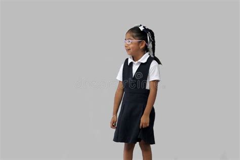 Year Old Latina Girl With Glasses Braids And Uniform Celebrates Back To School And Her