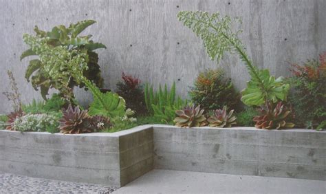 Board formed concrete wall. Driveway??? | Garden design, Front yard ...